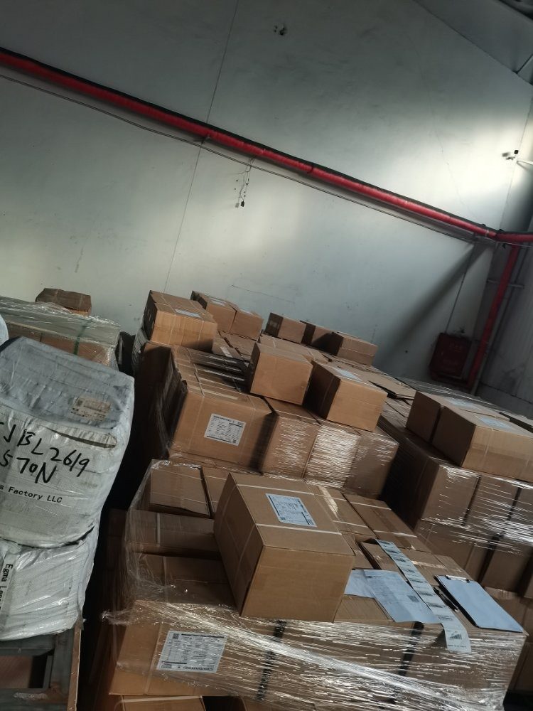 Warehouse floor stocked with export-ready cartons